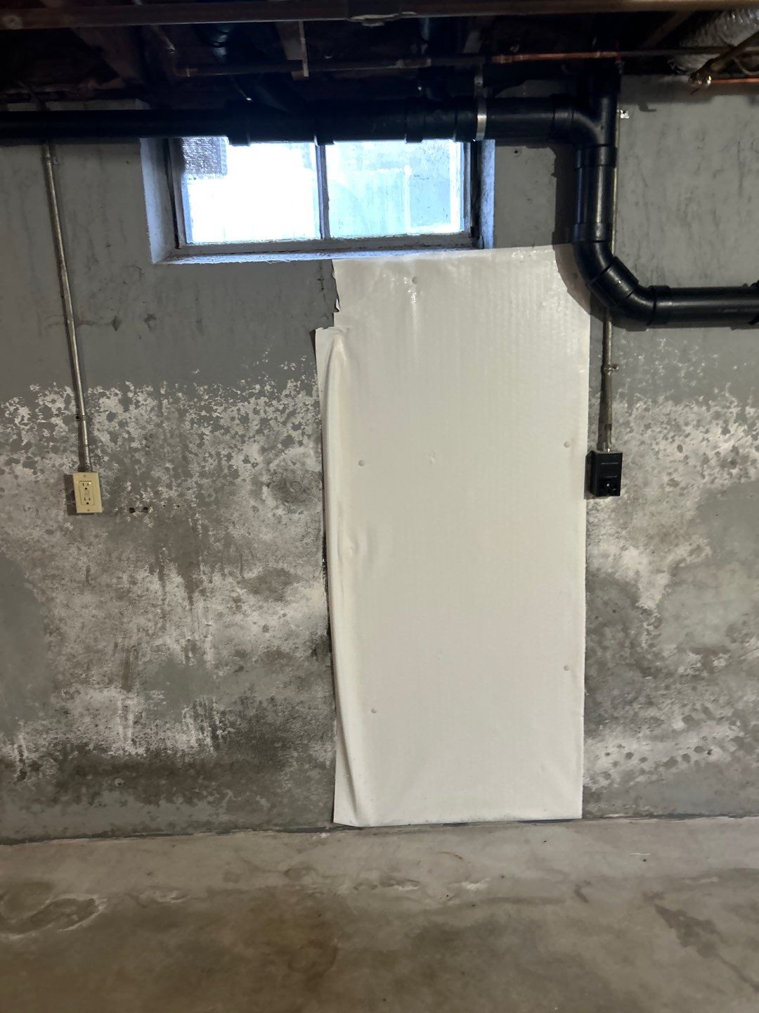 Before egress window installation in Lebanon, Connecticut — interior view
