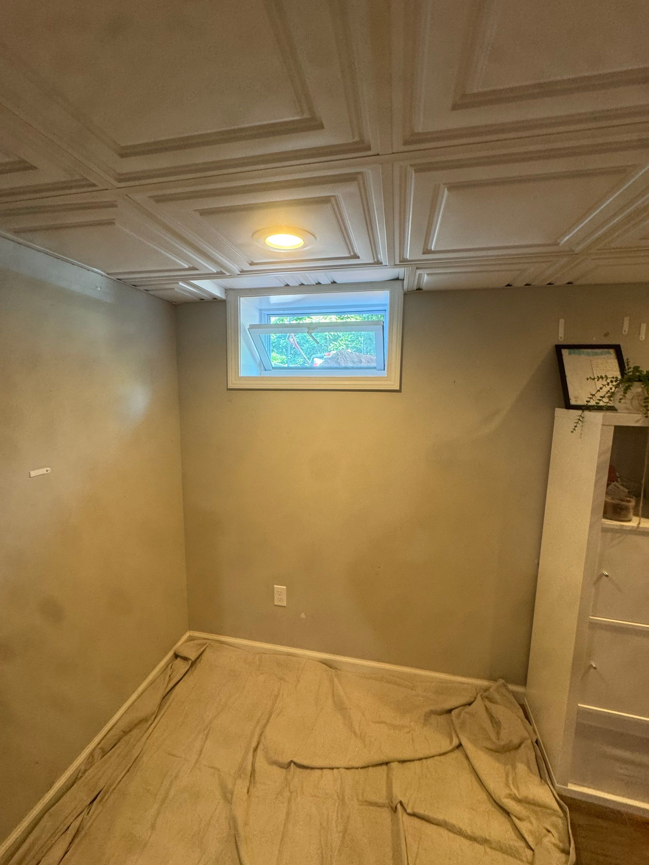 Before egress window installation in Glastonbury, Connecticut — interior view